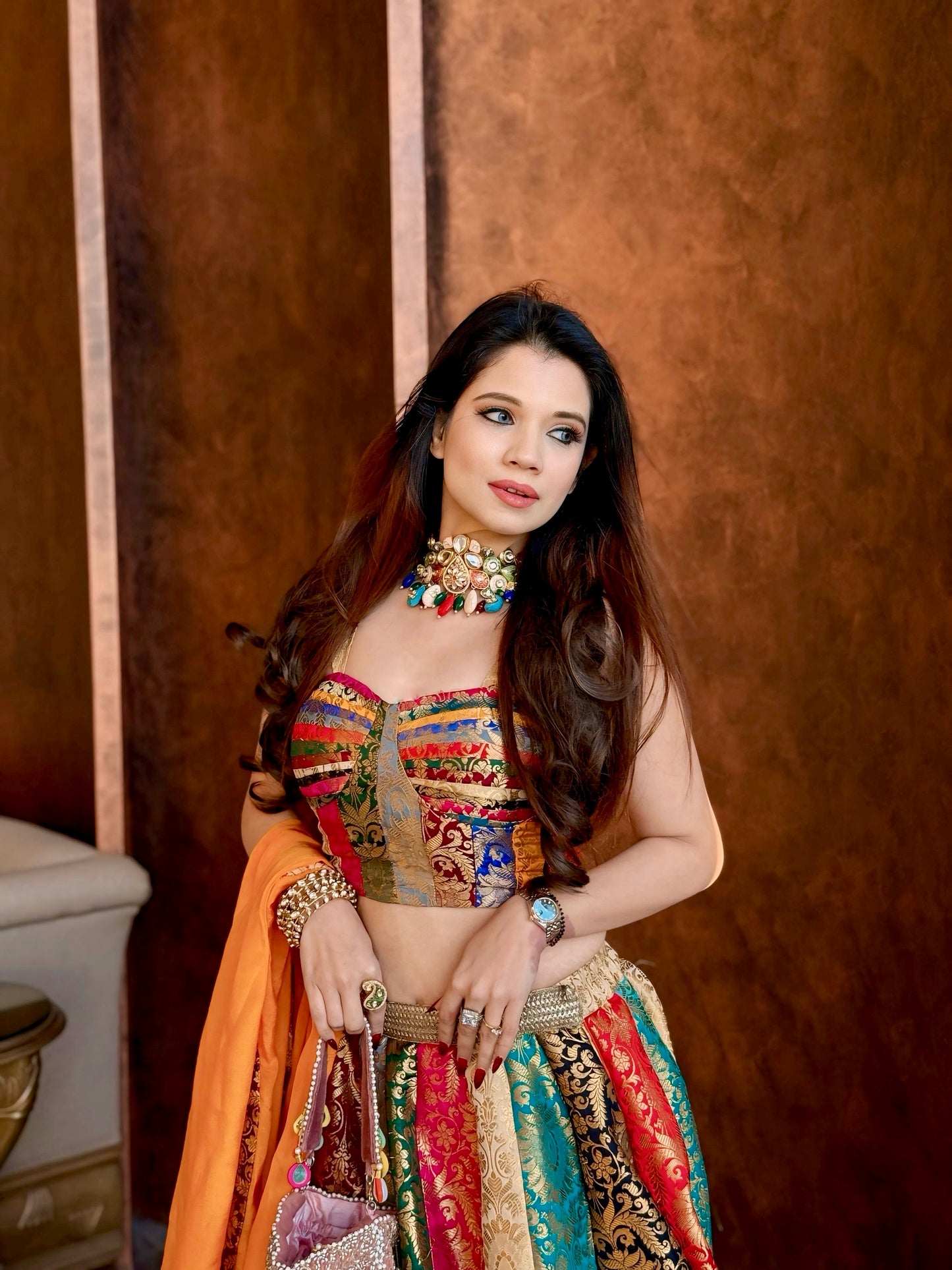 Multicolour Patchwork Brocade Lehenga Set with Corset Blouse & Orange Dupatta