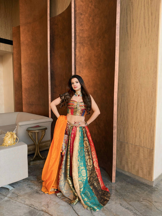 Multicolour Patchwork Brocade Lehenga Set with Corset Blouse & Orange Dupatta